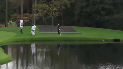 Jon Rahm skips a golf ball over water 3 times into a hole-in-one