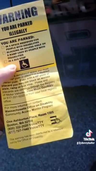 Cop blocks a handicap spot but you better not mess with him.