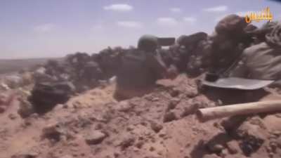 A Yemeni fighter gets shot 