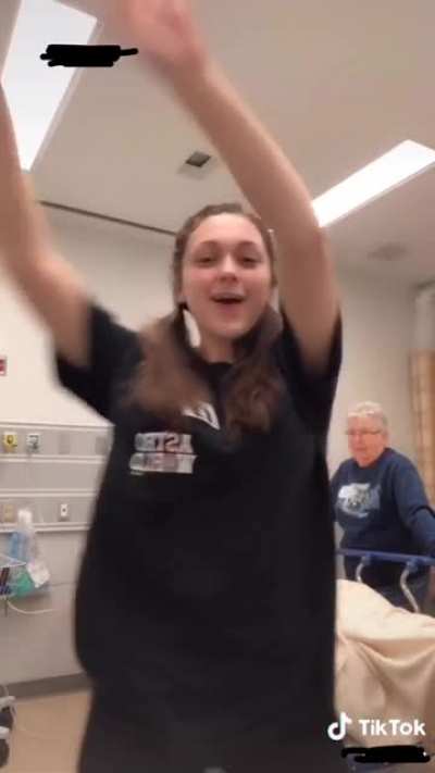 Girl does Tik Tok next to DYING GRANDFATHER