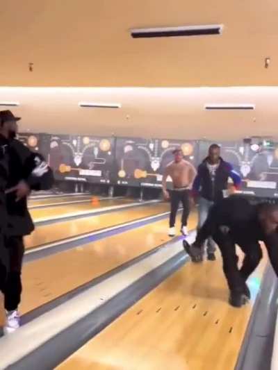 Dude gets jumped by DaBaby and his crew at a bowling alley