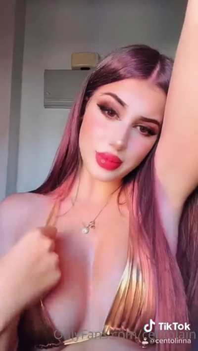 Big tits can&rsquo;t hide the heartache in her eyes. (NSFW)