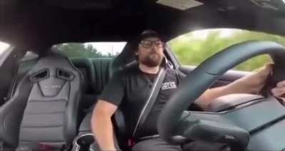 Guy drifts Mustang into a parallel park