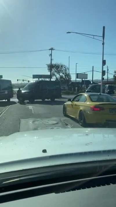 This Amazon driver blew a stop sign, stopped short and blocked two lanes of traffic. He then jumped out and held a stop sign at us so that an entire fleet of Amazon vans could also ignore the intersection stop sign.