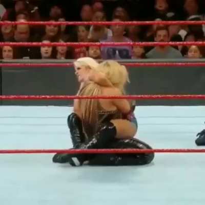 Natalya having Alexa in a position we all want to have her