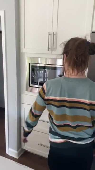 Man puts fork in microwave