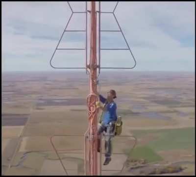 Every six months this man in South Dakota climbs this communication tower to change the light bulb. He is paid $20,000 per climb