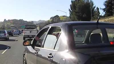 Crazy old lady cuts in front, then gets mad that she got honked.