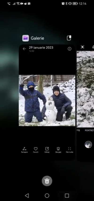 Guys making snowmen: