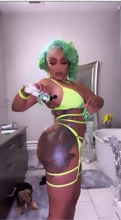 Irene the Dream in lingerie and oiled up