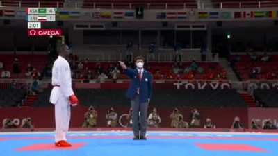 Athlete on the verge of country's first gold medal disqualified for a kick "too hard"