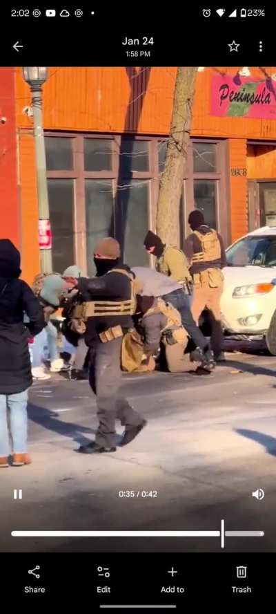 Footage of the grey coat officer retrieving the gun