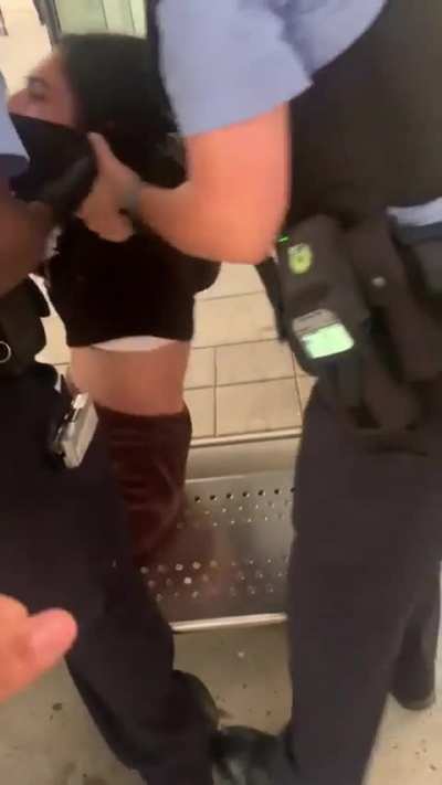 Crazy girl freaks out on transit officers
