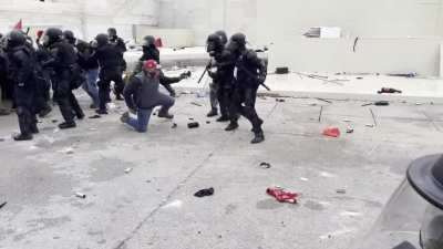 Video shows several people being arrested and hand to hand combat with police on Capitol steps (Parler Leak)