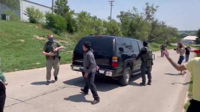 Clash between protesters and federal agents at ICE raid in Omaha