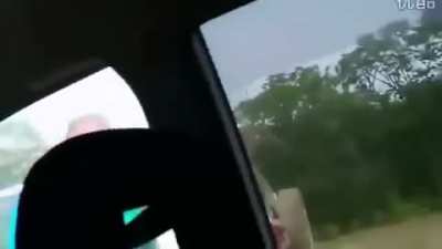 Tough guy driver eats grass after Father is left no choice but protect his family
