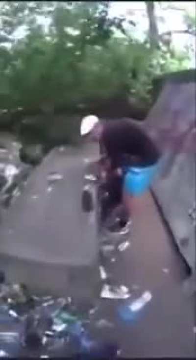 Man taking extreme measures to clean up the park