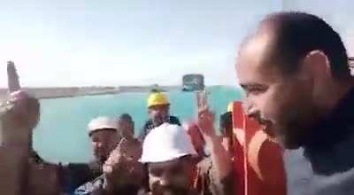 Egyptian crew of tug boat named Mashour celebrate after freeing of Ever Given by chanting "Mashour is number 1"