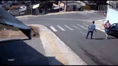 Man Saves Car from Falling off the Street