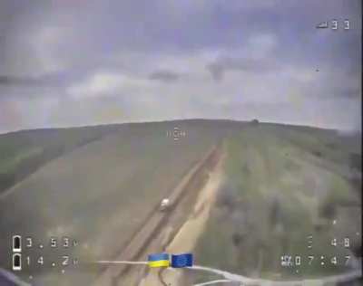 Ukrainian Kamikaze Drone stalks a Russian vehicle. Delivers its payload through the driver side window. Location: Bahkmut