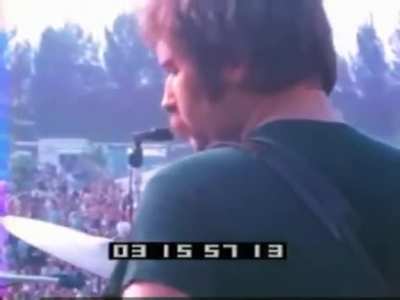 Video clip of Hendrix playing the guitar between his legs