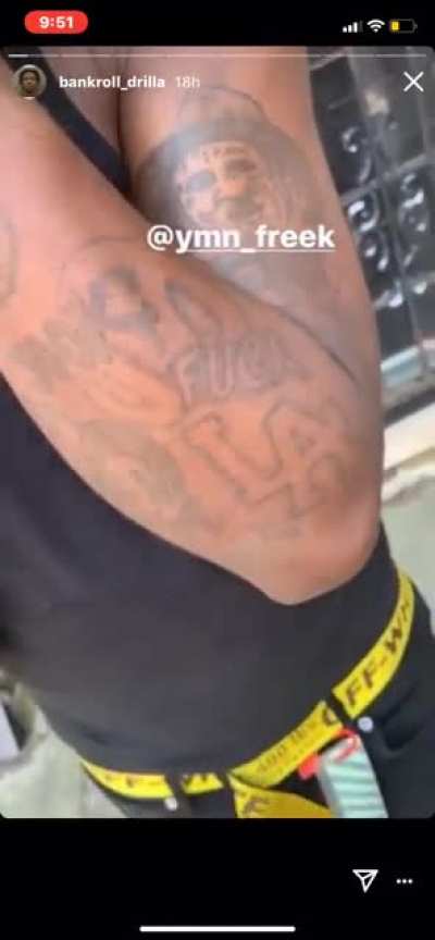 051 Freeky shows his “Fuck LA” tattoo