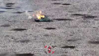 The Ukrainian "Shadow" drone unit released another video how a drone pilot drops a US M67 grenade through the open hatch of a Russian T-80 BVM. High difficulty level in this video and turret toss included.