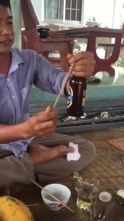 WCGW opening a bottle with a chopstick