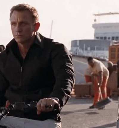 An extra can be seen sweeping away air in the James Bond film "Quantum of Solace" (2008).