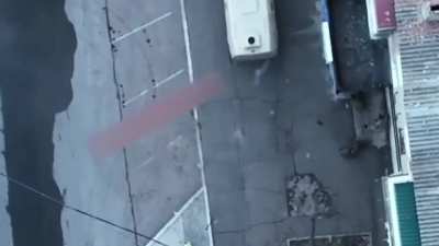 [UKRAINIAN WAR CRIME] Ukrainian quadcopter drone drops grenades on civilians in Donetsk city.