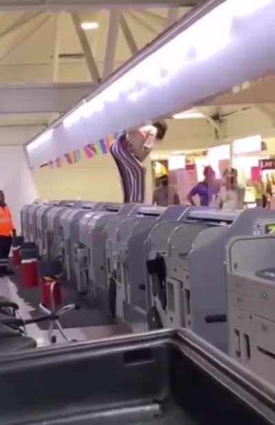 Passenger having a meltdown at the airport check in