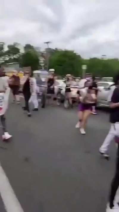 Protesters bust cop car windows in the wake of the George Floyd murder