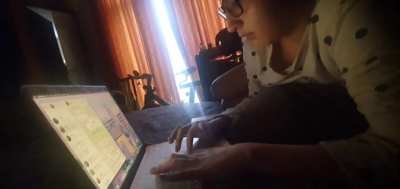 My sister angrily typing her classmate