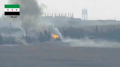 FSA 13th Division BGM-71 TOW team hits an SAA T-55, part of an armored column near al-Masasna - 10/7/2015