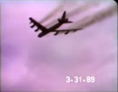 Multiple B-52 &amp;amp; KC-135A "wet" takeoffs leave a heavy cloud of black smoke lingering over the runway (1989)