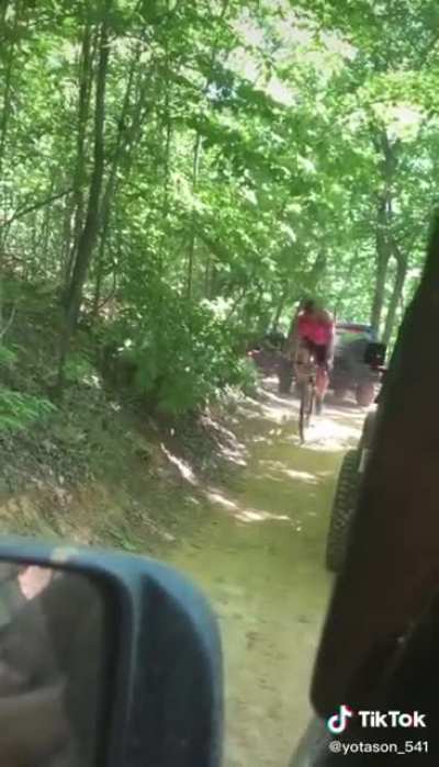 Mountain biker out on the trail slips up