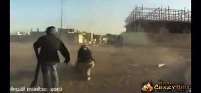 Rebel/Militia/Insurgent likely killed by RPG backblast.
