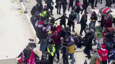 Crazy Video Shows Fire Extinguisher Thrown At Capitol Riot