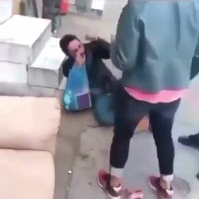 Guy sitting on the stairs got the worst hit out of the whole fight