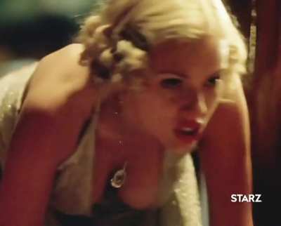 Scarlett Johansson in the familiar position of being bent over with her tits swaying.