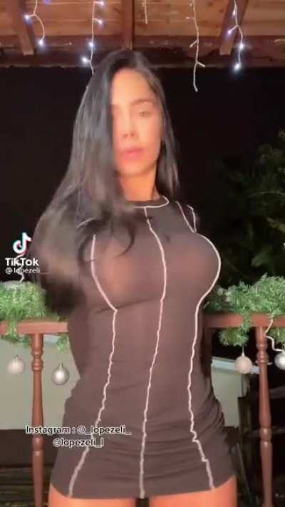w/ Both Arms Tied Behind Her Back