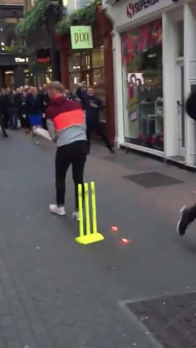 Joe Root bowling Ben Stokes out in the streets of London. Incredible send off