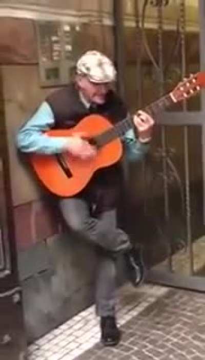 This man ain’t a guitarist, he’s the whole damn band:-)