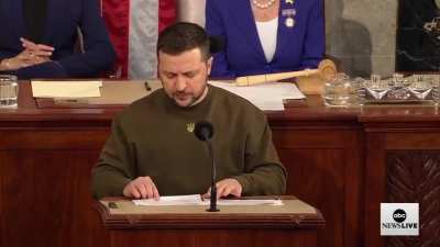 Pres. Zelenskyy ends his address to Congress by displaying a battle flag given to him by soldiers on the front line. &ldquo;This flag is a symbol of our victory...We stand, we fight, and we will win because we are united. Ukraine, America, and the entire free w