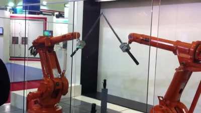Robots showing off precision with katanas