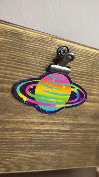 This sparkly planet sticker is not NASA approved