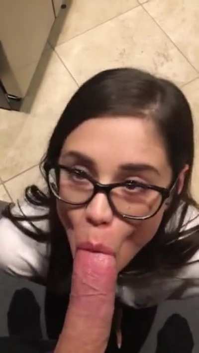 Cute brunette sucking dick
