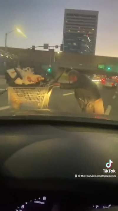 Man on drugs blocks Santa Monica Blvd with his cart full of trash then attacks nice Christian man.