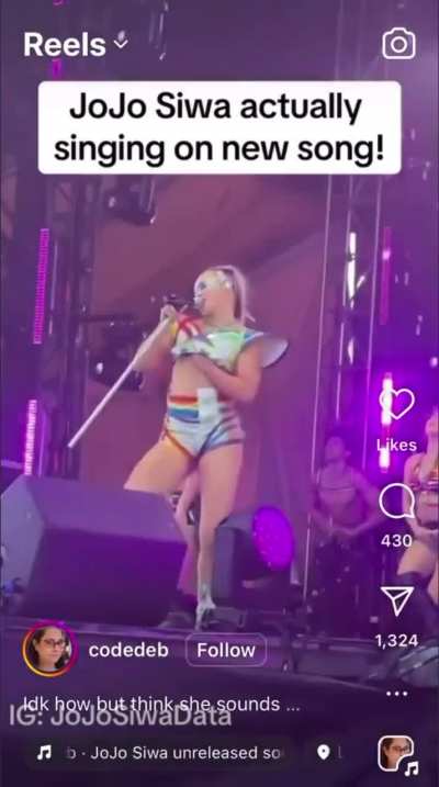 Jojo Siwa touching herself on stage while performing