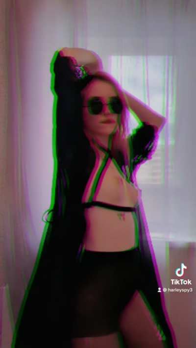 playful redhead dancing for you topless